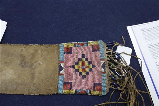 A Native American buckskin and beadwork gauntlet, Northern Plains, 19th century, Approx 45cm